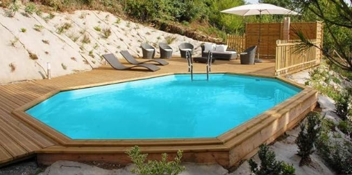 Piscina de madera ovalada SUNBAY 672 x 472 x 146 cm con escalera Ext. Madera/Int. Acero inoxidable y filtro de arena